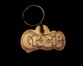 Handmade brass and copper pet tag