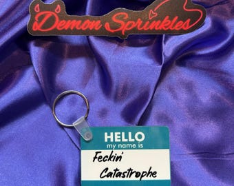 Leather and Lark Inspired Hello My Name Is: Feckin&#39; Catastrophe - Double sided MDF Keychain- Butcher and Blackbird - Ruinous Trilogy