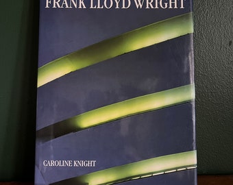 Essential Frank Lloyd Wright by Caroline Knight. 2001. First Edition. Hardcover with Dust Jacket.