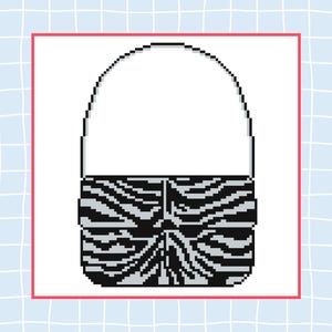 May include: A pixelated handbag with a zebra print design in black and white. The bag has a curved handle and a rectangular body. The background is a light blue grid pattern.