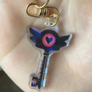 Hazbin Hotel KeeKee Hotel Key Holographic Acrylic 1.5-inch Phone Charm or Keychain with Gold Chain