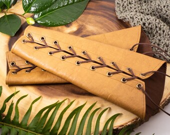 Faux Leather Cuffs SMALL tan beige brown rounded pleather Bracers brass grommets brown laces (PAIR) elven armor renaissance fairy costume