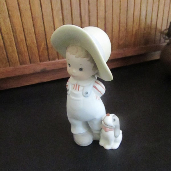 Country Boy & His Dog Bearing Gift Porcelain Figurine – Boy in Blue Overalls with Present Behind Back – Vintage Homco Figurine