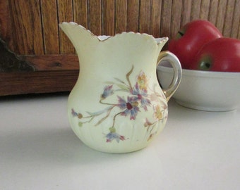 Antique Embossed Porcelain Blue and Yellow Floral Creamer - Petal-Style Opening, Gold Trim - Porcelain Cream Pitcher by Rudolstadt