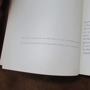 May include: A close-up of a white page with black text. The text reads "THE ENTIRE CONTENTS OF THIS EDITION ARE COPYRIGHT 1949 BY THE LIMITED EDITIONS CLUB FOR THE GEORGE MACY COMPANIES, INC."