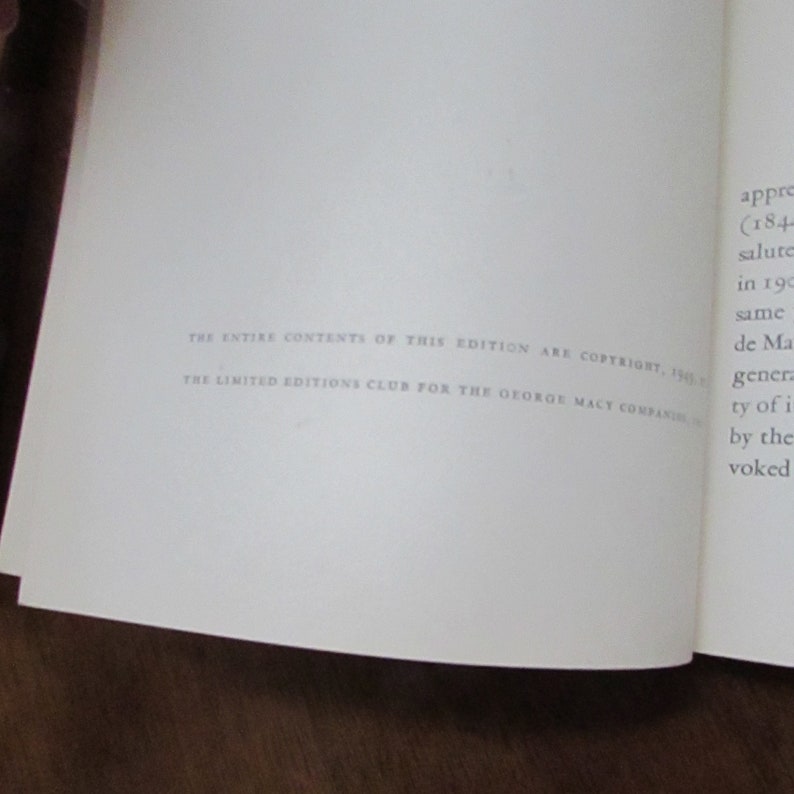 May include: A close-up of a white page with black text. The text reads "THE ENTIRE CONTENTS OF THIS EDITION ARE COPYRIGHT 1949 BY THE LIMITED EDITIONS CLUB FOR THE GEORGE MACY COMPANIES, INC."