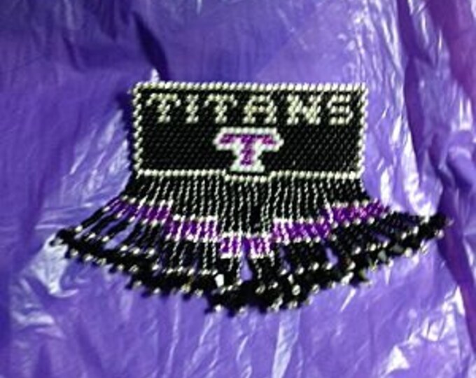 Beaded Titan Brooch