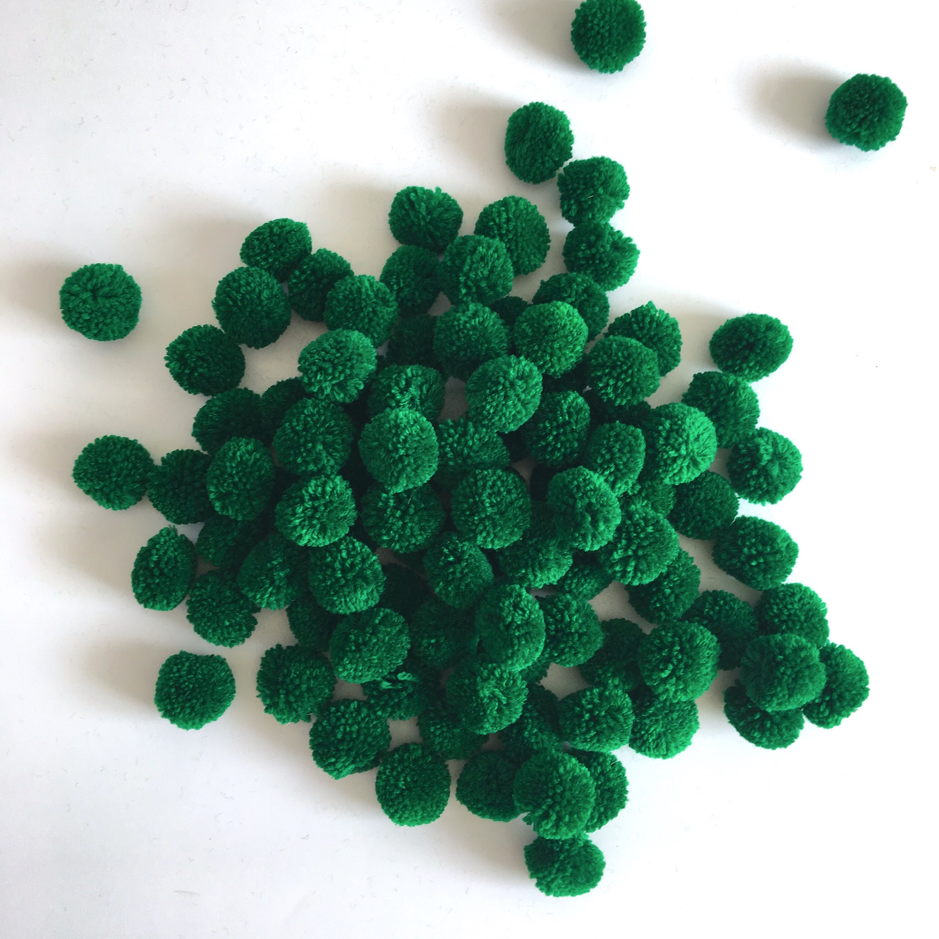 green pom poms green pom poms