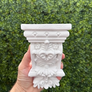 May include: A rustic wooden sign with the text "Welcome to our home" in white lettering. The sign features a distressed finish and a simple, inviting design, perfect for a front porch or entryway.
