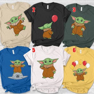 May include: A set of three ceramic mugs with a speckled, matte finish. The mugs are in shades of cream, light gray, and dark gray. Each mug has a simple, minimalist design, perfect for coffee or tea.