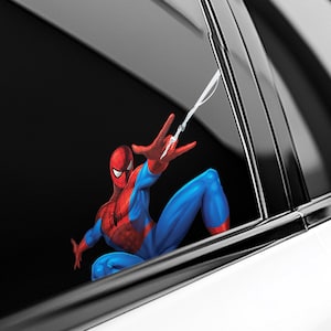 May include: A red and blue Spider-Man character decal with a web line, perfect for a car window.
