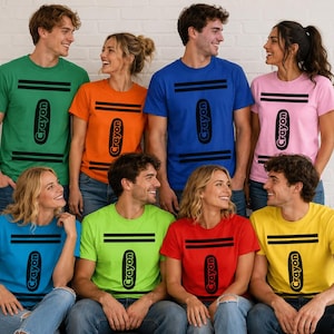May include: A collection of eight short-sleeved t-shirts in various solid colours including green, orange, blue, pink, light blue, lime green, red, and yellow. Each shirt features two horizontal black lines and the word Crayon in black text.