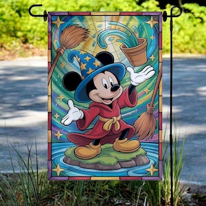 May include: A garden flag featuring Mickey Mouse as a wizard, with a blue hat and red robe, standing on a small island. The background has a stained-glass effect with stars, water, and brooms. The flag is rectangular and is hanging on a black metal stand.