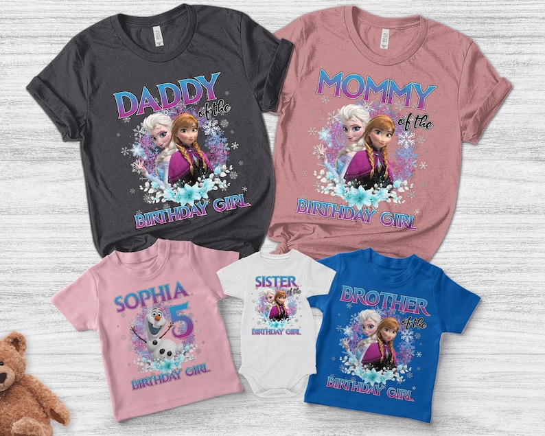 May include: A collection of short-sleeved t-shirts and a onesie featuring characters from a popular animated film. The shirts are in various colors, including charcoal, pink, white, and blue, with text such as "Daddy", "Mommy", "Sister", and "Brother" along with "Birthday Girl".