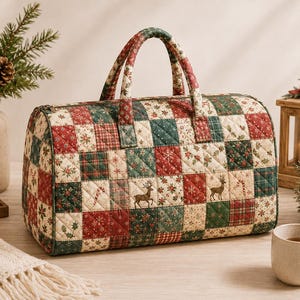 May include: A quilted duffel bag featuring a patchwork pattern of red, green, and cream squares. The fabric displays holiday-themed motifs including reindeer, candy canes, holly leaves, and snowflakes. The bag has two top handles and a zipper closure.