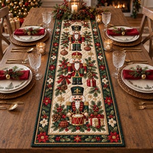 May include: A rectangular quilted table runner featuring three nutcracker figures, pine branches, red berries, and gift boxes on a cream background, bordered by a dark green trim decorated with red poinsettia flowers and holly leaves.