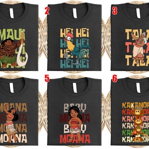 May include: Six black t-shirts with colorful graphics and text from the animated movie Moana. The designs include characters like Maui, Hei Hei, Tala, Moana, Baby Moana, and the Kakamora.