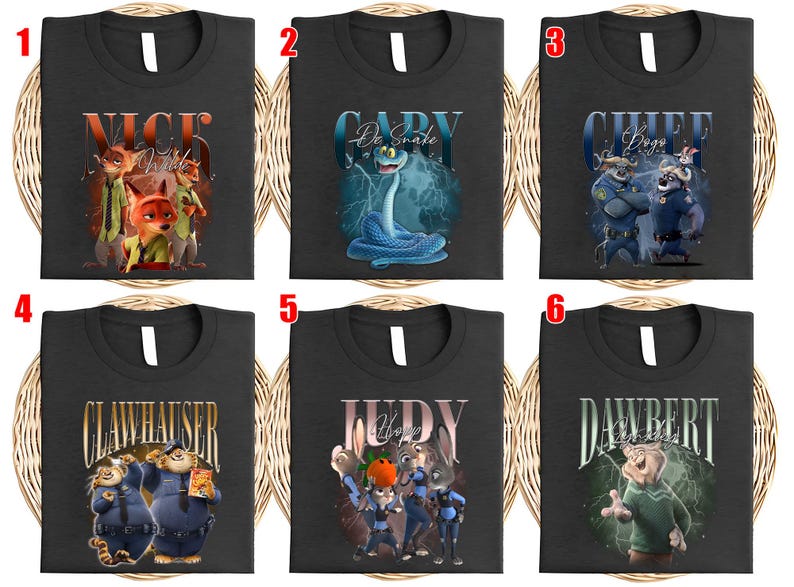 May include: Six black t-shirts with different character designs from the movie Zootopia. The designs include Nick Wilde, Gary the snake, Chief Bogo, Clawhauser, Judy Hopps, and Dawbert. Each shirt features a unique graphic and character name.