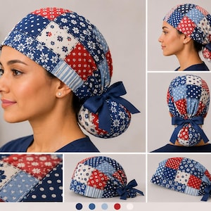 May include: A scrub cap featuring a patchwork design of red, white, and blue fabric squares with floral, polka dot, and striped patterns. The cap includes a gathered back pouch for hair and a solid navy blue ribbon tied into a bow at the back.
