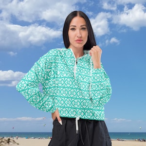 Women’s cropped windbreaker | Turquoise with White Classic Flower Design | Lightweight | Hooded | Casual style | Outdoor Chic