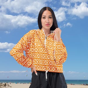Women’s cropped windbreaker | Orange with White Classic Flower Design | Lightweight | Hooded | Casual style | Outdoor Chic