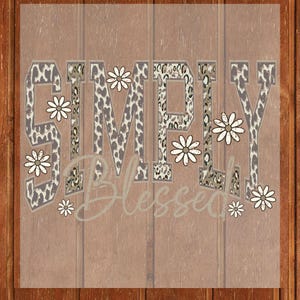 May include: A graphic design featuring the words "SIMPLY Blessed" in a mix of fonts and styles. The word "SIMPLY" has a leopard print pattern, and the design includes daisy flower accents on a wooden background.