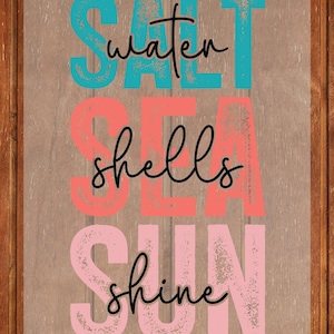 May include: A rectangular sign with the words "SALT SEA SUN" in large, textured, colorful letters. The words "water", "shells", and "shine" are written in a cursive font. The background is a wooden texture.