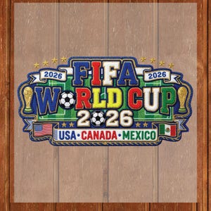 May include: Embroidered patch featuring the FIFA World Cup 2026 logo. The design includes the text "FIFA WORLD CUP 2026" with soccer balls, the flags of the USA, Canada, and Mexico, and gold accents.