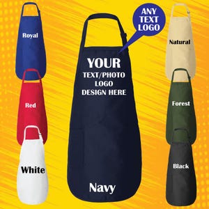 May include: Ten different colored aprons with a pocket on the front. The aprons are navy, red, white, black, forest green, natural, and royal blue. The text "YOUR TEXT/PHOTO LOGO DESIGN HERE" is on the navy apron. The text "ANY TEXT LOGO" is in a speech bubble above the natural apron.