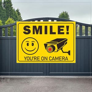 Smile You&#39;re on Camera Sign – Surveillance Warning Metal Sign for Home or Business