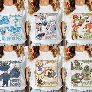 Pode incluir: T-shirts brancas com personagens do filme de anima&ccedil;&atilde;o "Zootopia 2". Cada camisa tem um design diferente, incluindo "Gary De Snake", "Judy Hopps", "Nick Wilde", "Chief Bogo", "Finnick" e "Flash".