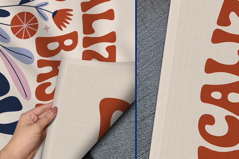 May include: Off-white fabric featuring a retro floral design and the words "California Breeze" in orange. The design includes orange flowers, blue and pink leaves, and a star. The fabric is being held up by a hand.