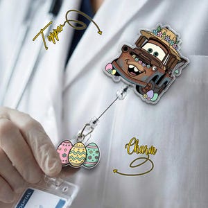 May include: A badge reel featuring a cartoon image of Tow Mater from the movie Cars, wearing a straw hat with flowers. The reel also includes a charm with three Easter egg designs. The word "Topper" is written above the reel.