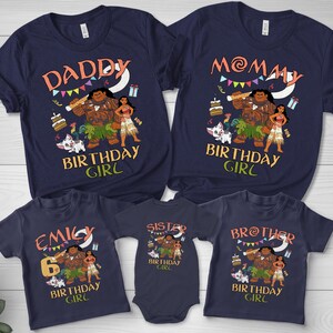 May include: A set of five navy blue short-sleeved shirts and a baby bodysuit featuring a Moana-themed graphic with Maui, Moana, and Pua. The shirts display text including DADDY, MOMMY, EMILY, SISTER, BROTHER, and BIRTHDAY GIRL with colorful party accents.