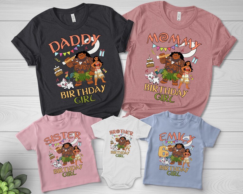 May include: A collection of five short-sleeved shirts and one white bodysuit featuring Moana-themed birthday graphics. The shirts are black, mauve, light pink, and light blue, each displaying characters, party decorations, and text like DADDY, MOMMY, SISTER, BROTHER, and EMILY.