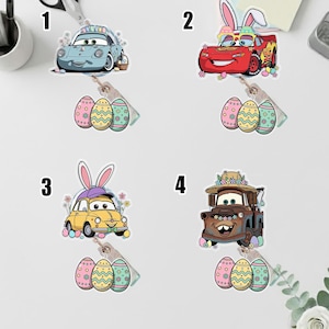 May include: Four colorful car-shaped Easter-themed stickers. The stickers feature cartoon cars with bunny ears and Easter egg accents. Each sticker is paired with a set of three decorative Easter egg stickers. The cars are in blue, red, yellow, and brown.
