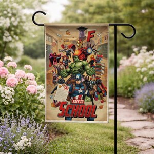 May include: A garden flag featuring a collage of Marvel superheroes with the text "Back to School". The flag includes Captain America, Hulk, Iron Man, and other characters in a classroom setting. The flag is displayed on a black metal stand.