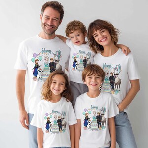May include: A family of five wearing white t-shirts with a colourful graphic from the film "Frozen", a birthday cake and the number 4. The coordinated design is suitable for a birthday celebration.