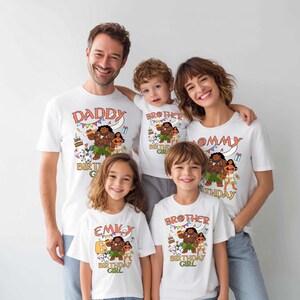May include: A set of white short-sleeved t-shirts featuring a colorful graphic print of characters from the movie Moana. The shirts include text such as DADDY, MOMMY, BROTHER, and EMILY, along with the phrase BIRTHDAY GIRL and birthday icons.