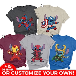 May include: Collection of t-shirts featuring cartoon character Stitch in various superhero costumes. Designs include Spider-Man, Captain America, Iron Man, Deadpool, and Loki. The shirts are in various colors, including gray, beige, burgundy, and blue. Text on the bottom reads "+15 DESIGNS! OR CUSTOMIZE YOUR OWN!"