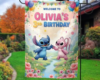 May include: A garden flag featuring the characters Stitch and Angel from Lilo & Stitch. The flag reads "WELCOME TO OLIVIA'S 3rd BIRTHDAY" in pink and blue text. The background is a pastel sky with balloons and flowers.