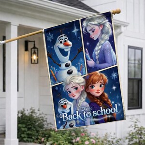 May include: A rectangular outdoor flag featuring characters from the movie Frozen. The flag has a dark blue background with images of Elsa, Anna, and Olaf. The words "Back to school" are printed on the flag.