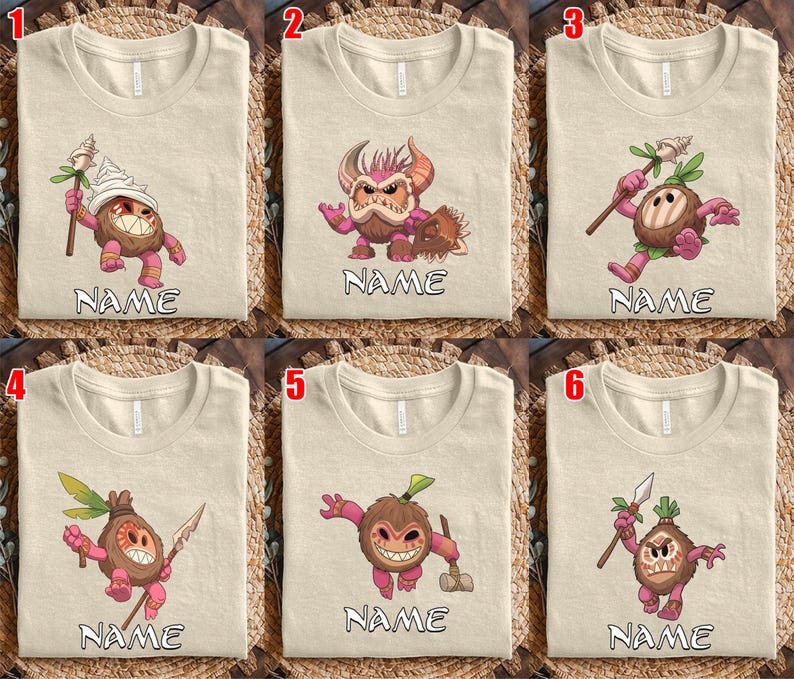 Puede incluir: Camisetas beige con dise&ntilde;os de personajes de dibujos animados. Cada camiseta presenta un personaje diferente con una expresi&oacute;n &uacute;nica y sosteniendo varios objetos. La palabra "NAME" est&aacute; impresa debajo de cada personaje. Las camisetas se muestran sobre una superficie tejida.