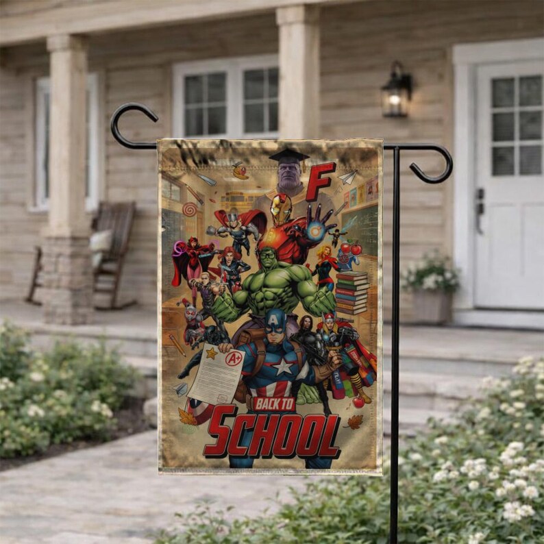 May include: A garden flag featuring a collage of Marvel superheroes with the text "BACK TO SCHOOL" in red. The flag has a vintage, comic book style with a school theme, including an "F" grade and a stack of books.