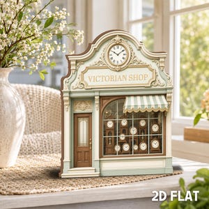 May include: A 2D flat decorative piece shaped like a Victorian shop storefront. The structure is painted in soft green and brown tones with ornate detailing, a central clock face, and the text VICTORIAN SHOP. The shop window displays clocks.