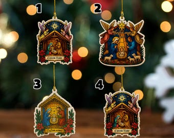 May include: Christmas ornaments with Nativity scenes. Each ornament features a colorful illustration of the Holy Family, angels, and stars. The ornaments have a gold string for hanging and the text "Custom Name".
