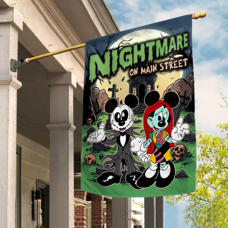 May include: A green outdoor flag featuring a spooky design with the text "Nightmare on Main Street." The flag depicts cartoon characters in a graveyard setting with a full moon. The characters are Mickey Mouse and Minnie Mouse, styled as Jack Skellington and Sally.