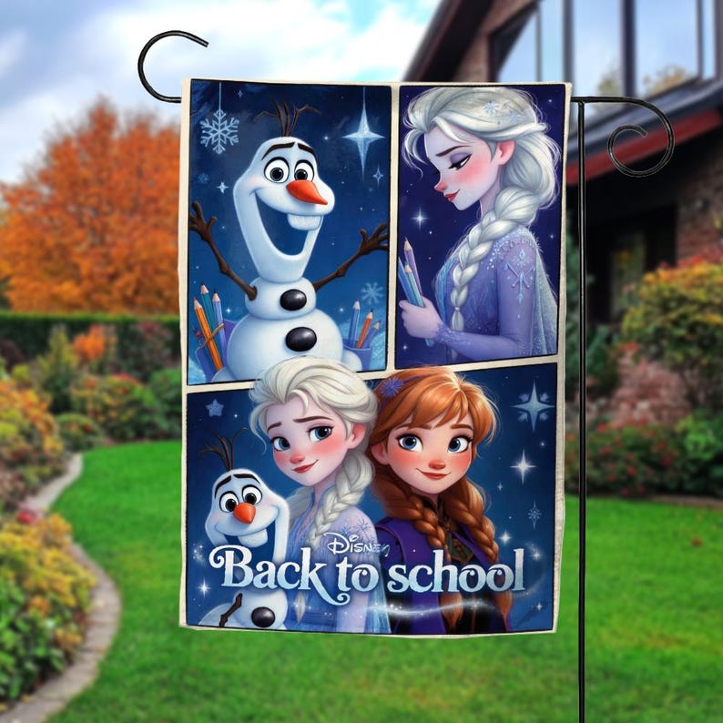 May include: A rectangular garden flag featuring characters from the movie Frozen. The flag has four panels with images of Olaf, Elsa, and Anna. The words "Back to school" are printed on the bottom panel. The flag is hanging on a black metal stand.
