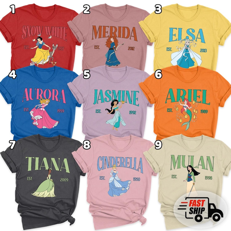 May include: A collection of nine colorful t-shirts featuring various Disney princess designs. Each shirt displays a princess's name, an illustration, and the year of their debut. The shirts are in various colors, including red, blue, and orange.