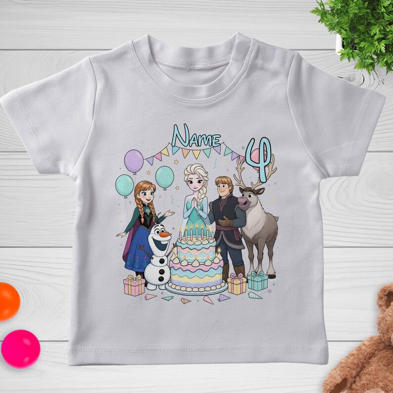 May include: White t-shirt featuring a colorful graphic of characters from the movie Frozen, including Elsa, Anna, Olaf, Kristoff, and Sven. The design includes a birthday cake, balloons, and the number 4. The word "Name" is also displayed.